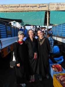 SIO PhD students Kate Furby (Sandin lab), Maggie Johnson and Emily Kelly at the fish market in Jeddah, Saudi Arabia.
